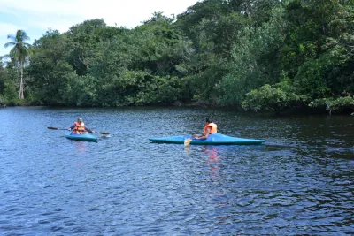 People kayaking in a lake in central america